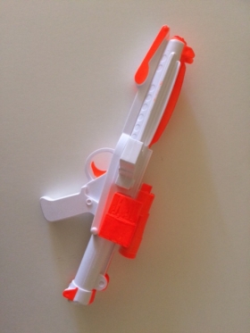 Toy gun with orange markings